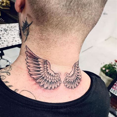 angel wings neck tattoo